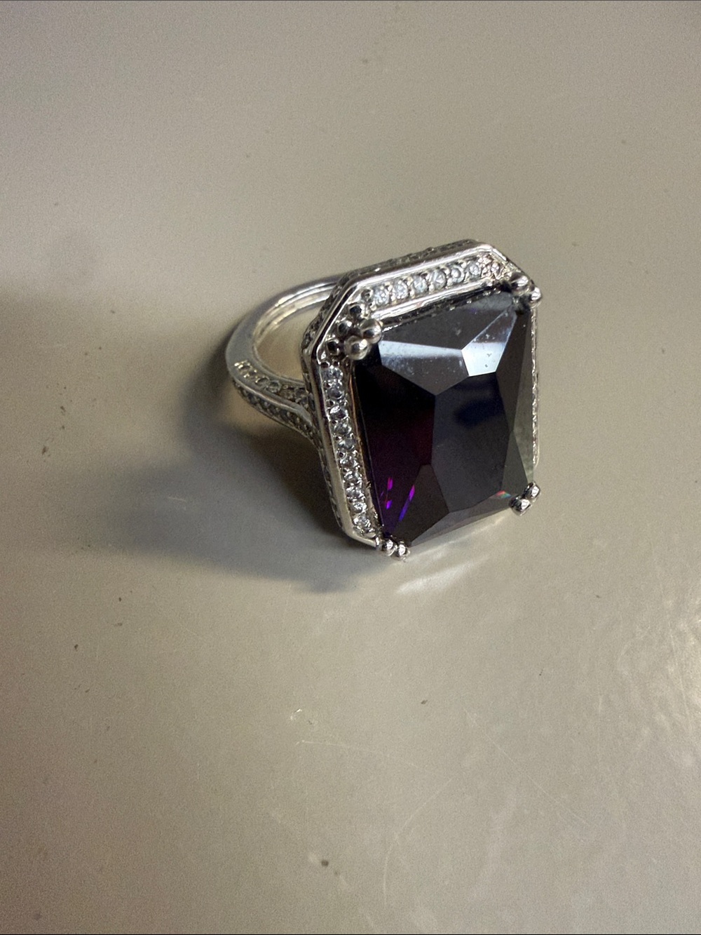 Avon Silver Tone Style Cocktail Ring Featuring a Large Glass Purple Gemstone